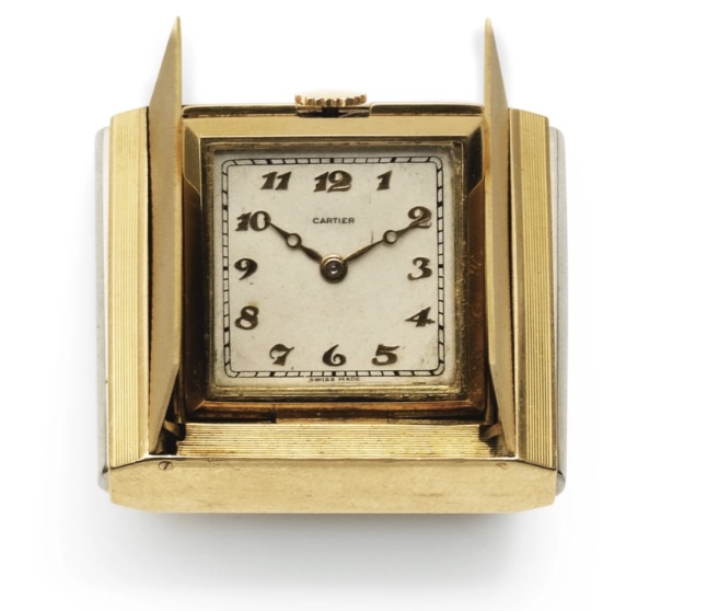 Sotheby's listing of the Cartier travel watch